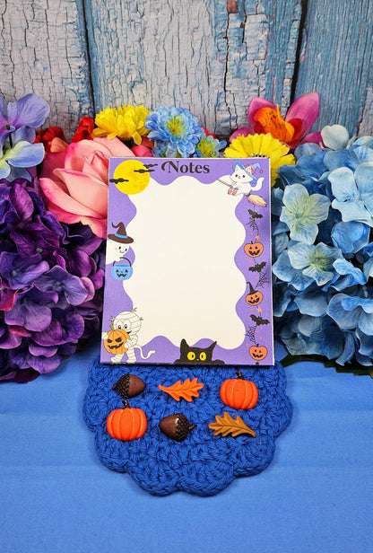 Cute Halloween notepad with ghosts, cats, pumpkins, and bats for fall journaling and notes.